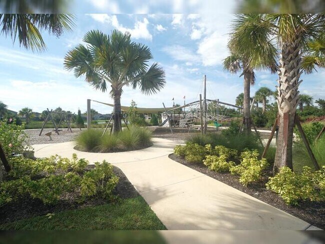 Building Photo - Stunning 5-Bedroom Lakeview Home in River Landing, Wesley Chapel