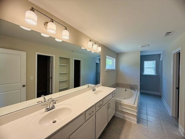 Building Photo - 4220 Easter Lily Ave