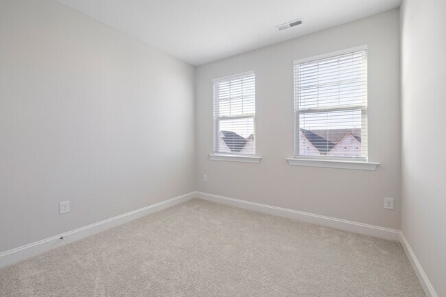 Building Photo - Available 08/15! Spacious Townhome in Prime Andrew Chapel Community