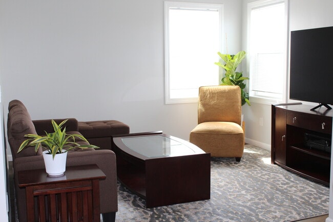 Living room with 65" LED TV - 3321 West St