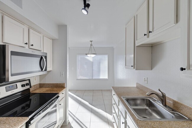 Building Photo - Welcome to Sunrise located in the Heart of...