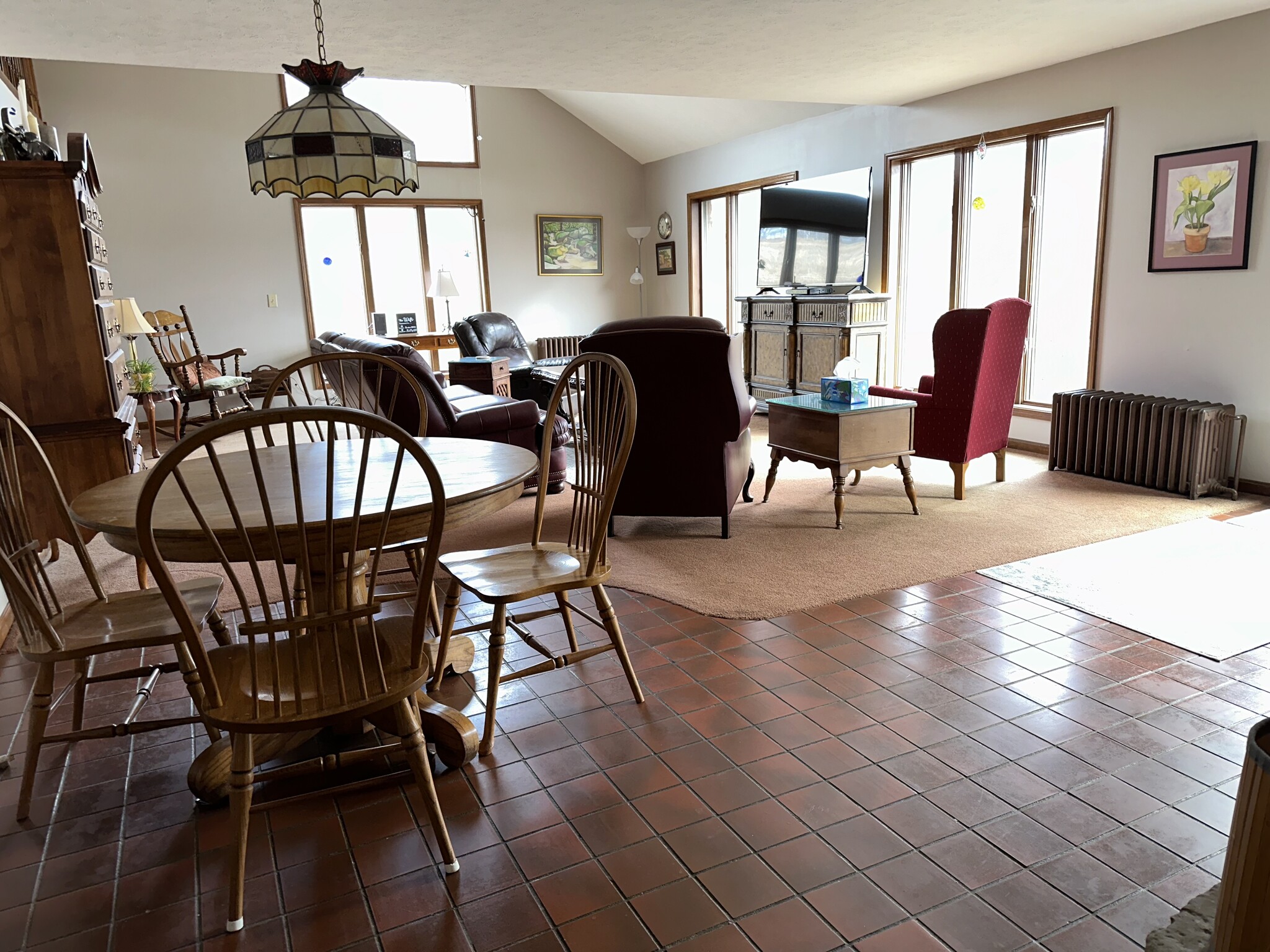 Great room with one of 3 tables in home - Nice place for informal dinner or playing cards or games - 7502 Borden Rd