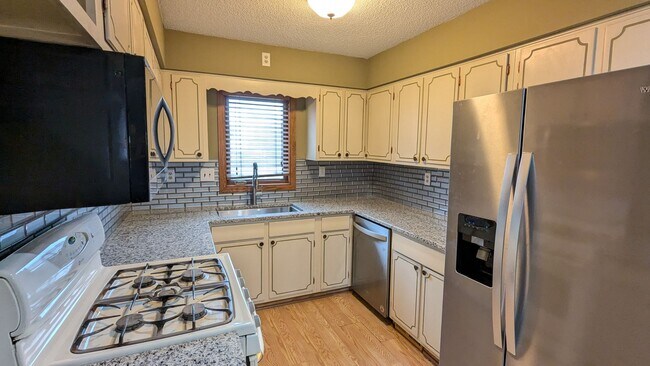 Building Photo - Well maintained 50s home with gorgeous kitchen