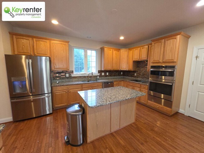 Building Photo - Beautiful 4-Bedroom Home in New Market – Hardwood Floors, Modern Kitchen, 2-Car Garage & Yard Car...