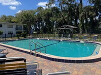 Building Photo - BEAUTIFULLY UPDATED CONDO POOL VIEW PERFECT LOCATION