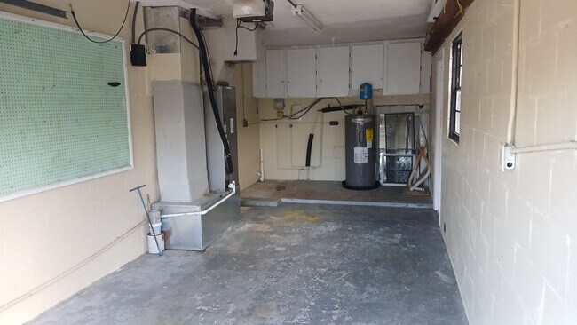 One car garage with Air conditioner Handler - 211 Sandy Cir