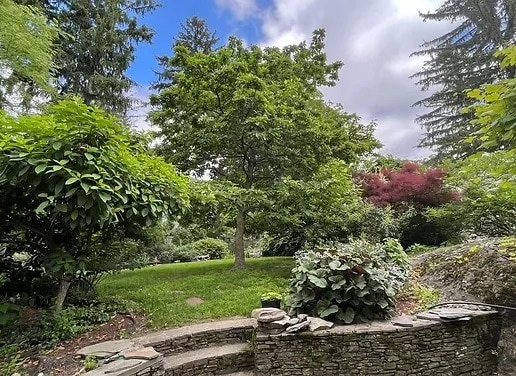 landscaped yard -- always something blooming - 7 Revere St