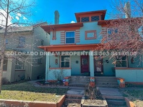 Building Photo - A home where old-world charm meets modern sophistication!