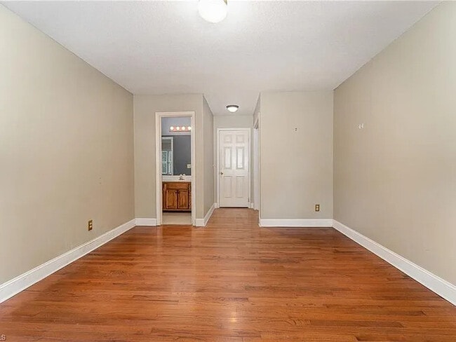Building Photo - Earn Wealth While Leasing - Like a Homeown...
