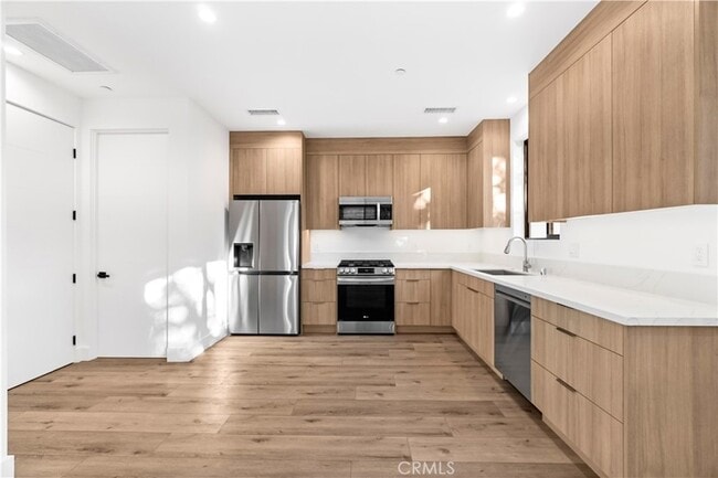 Building Photo - 7663 Maestro Ave