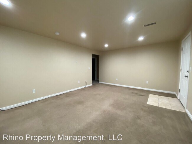 Building Photo - 6 br, 3.5 bath House - 8099 Pine Lake Circle