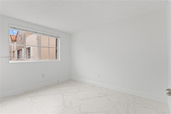 Building Photo - 6065 NW 186th St