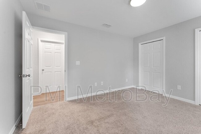 Building Photo - 9461 N Sandree Dr