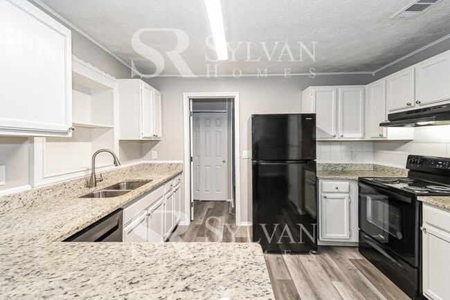 Building Photo - One-level living in this 3 BR, 2 BA home