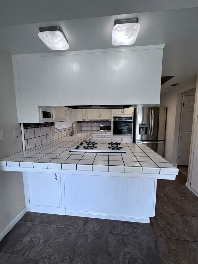 Building Photo - Spacious Condo coming soon!