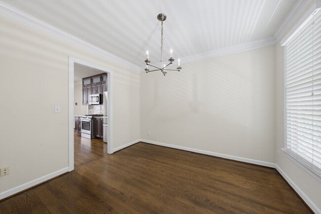 Building Photo - Southern Charm Meets Everyday Entertainment and Convenience!