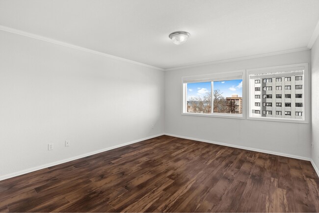 Experience the charm of city living with this bright and airy room. - Vista Terrace Apartments