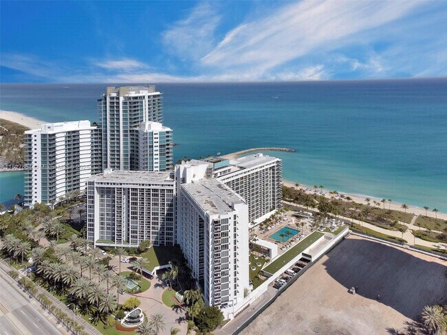 Building Photo - 10275 Collins Ave
