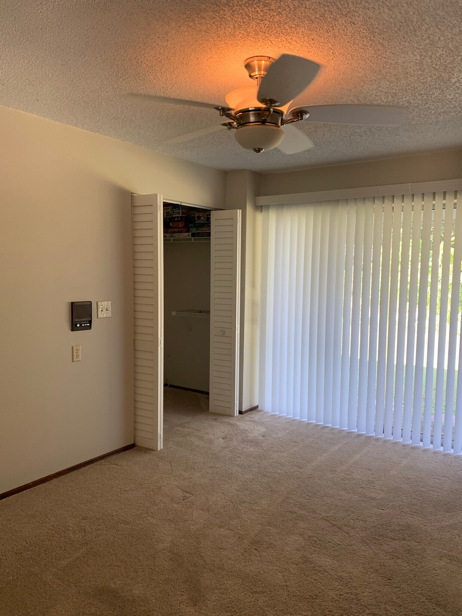 An office or study with a sliding door, offering easy access to the garden for outdoor enjoyment. - 5203 15th St W