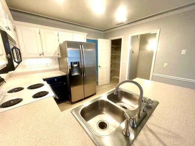 Stainless refrigerator and sink, pantry - 1946 Black Fox Xing
