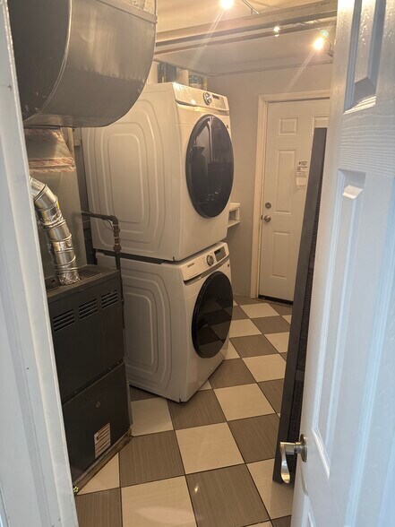 Laundry Room, has a Washer and Dryer included - 3318 S Quincy Ave