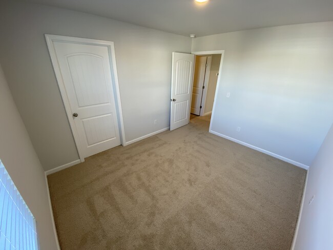 Bedroom 2 with walk-in closet - 9010 Fenton Rd.