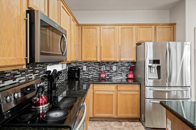 Building Photo - 8566 W Cinnabar Ave