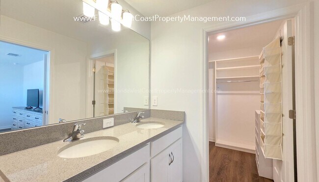 Building Photo - EXCEPTIONAL AND SPACIOUS FURNISHED TOWNHOME WITHIN WATERSIDE- NAUTIQUE!