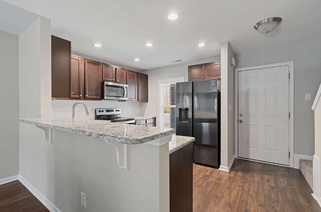 Building Photo - 2-Bed End Unit Townhome in Clayton