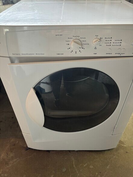 The washer & dryer are located in the basement & shared with only one other unit. - 4822 Oak St