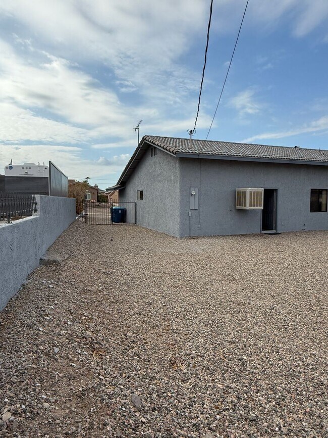 Building Photo - Available now - Unfurnished - Long Term