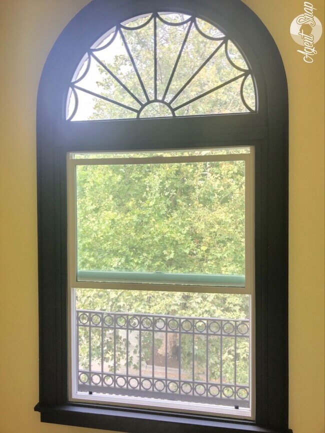 Building Photo - Classic Living at the Novell! Close to UW ...