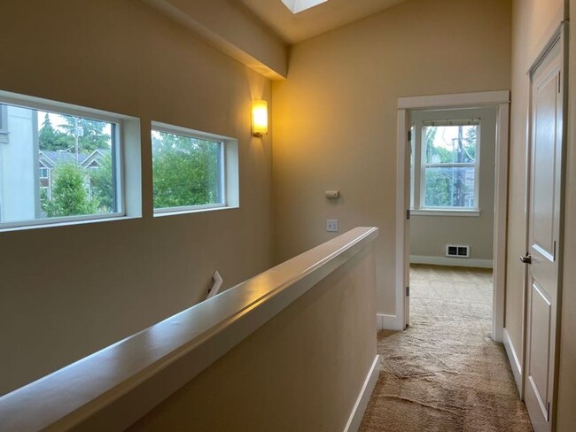 Building Photo - Light and Bright Greenwood Townhouse