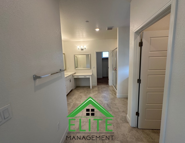 Building Photo - Spacious 5-Bedroom Home with Private In-La...