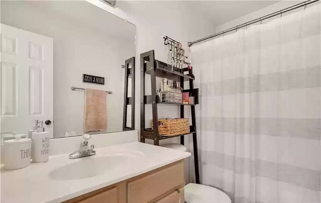 Bedroom 2 attached private shower - 876 Sagewood Trl