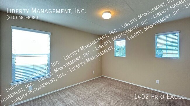 Building Photo - 1402 Frio Eagle