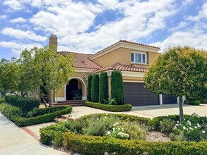 Building Photo - Elegant Mediterranean Living with Private Pergola Garden & Resort Amenities