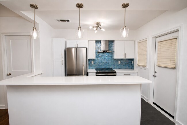 Building Photo - Live Near the Water & NAS Pensacola — Charming 3BR Cottage with Screened Porch, Character Details...
