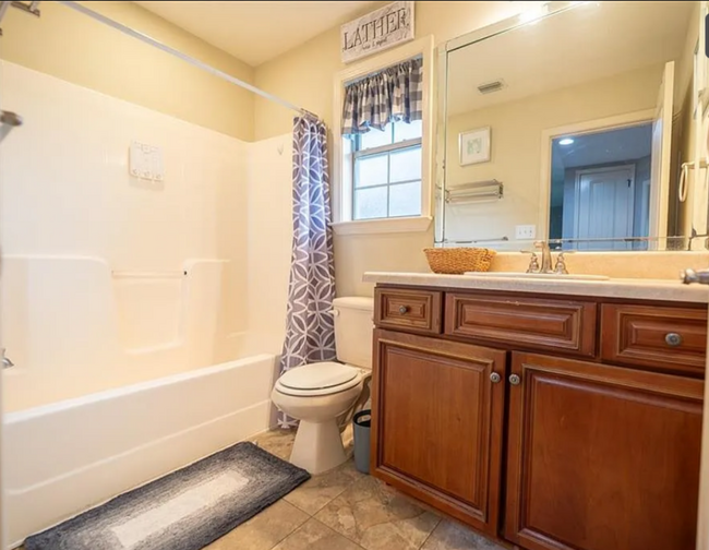 The 2nd Floor full bathroom serves Bedrooms 1, 2, and 3. Window faces South. - 12366 Copperwood Dr