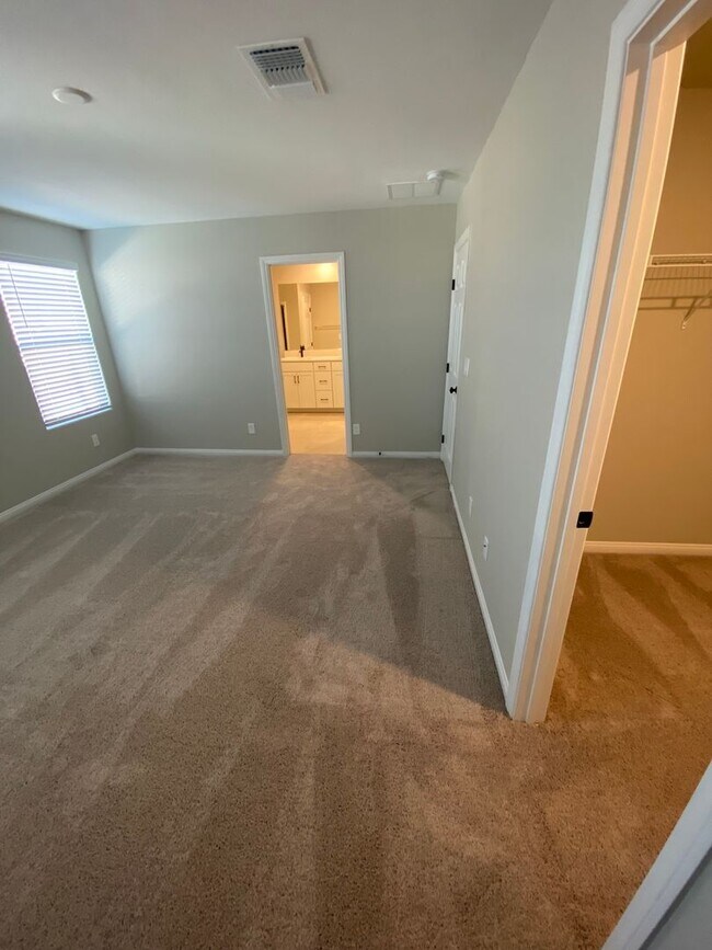 Building Photo - Americana Property Mgmt - 2022 built 4 bedrooms in prime South West Las Vegas