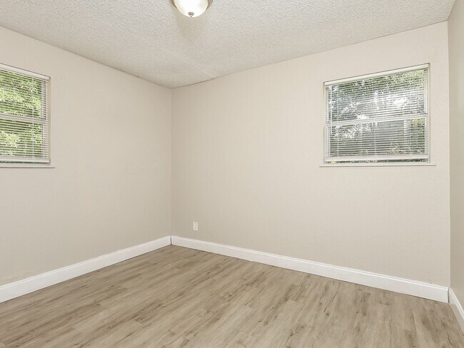 Building Photo - 3 BR/1BA | Newly Renovated Single Family Home | Screened in Patio and carpot | Huge backyard!