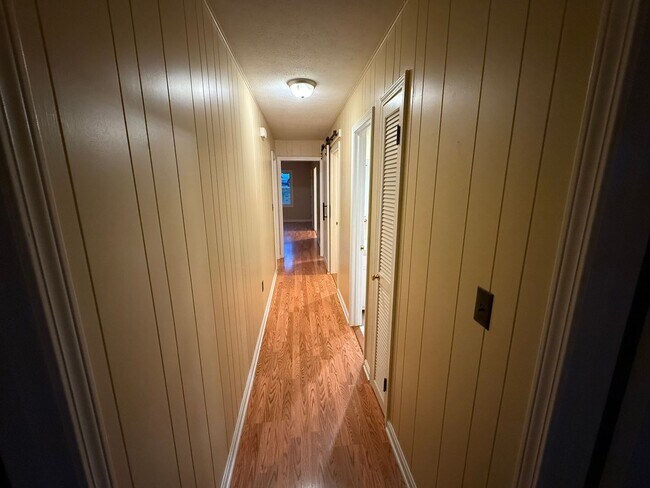 Building Photo - Updated 4BR Home with Finished Basement & Level Yard