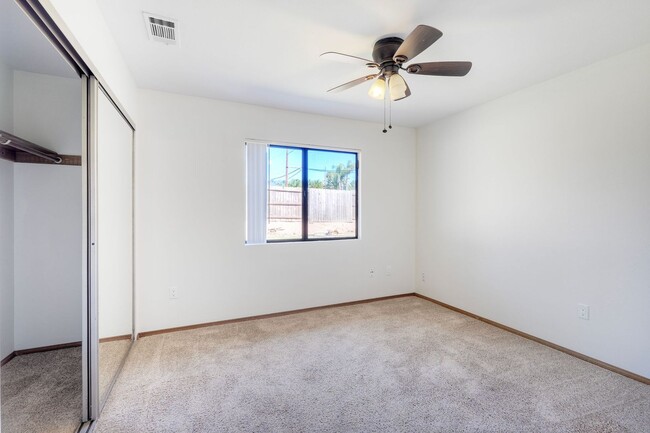 Building Photo - Corner Lot 4BR with Vaulted Ceilings & Big Yard