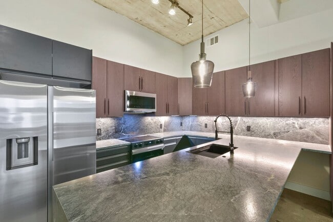 Building Photo - Modern Industrial Loft in the Heart of EADO!