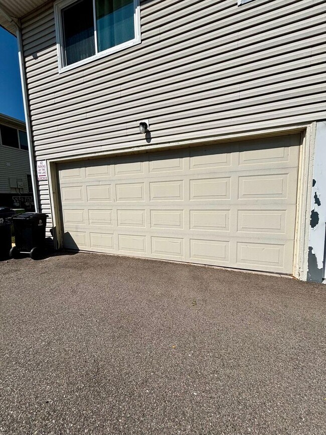 Building Photo - Live in Style! Updated Denver 2-Bedroom Townhome with Modern Design & Large 1-Car Garage!!