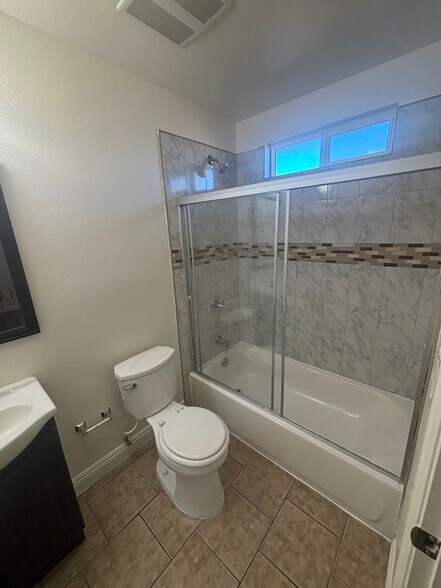 Building Photo - 8848 Orchard Ave