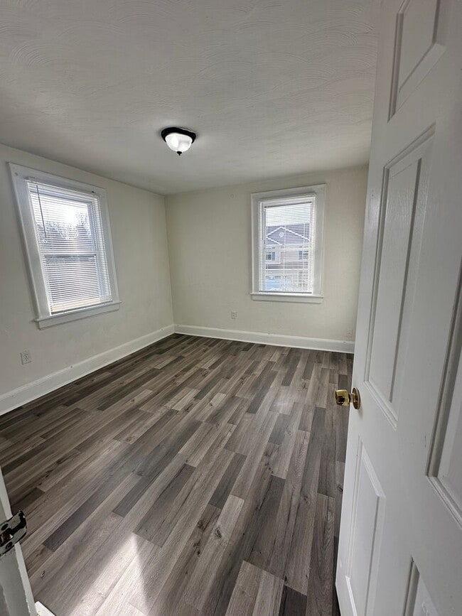 Building Photo - Three Bedroom Available Soon!