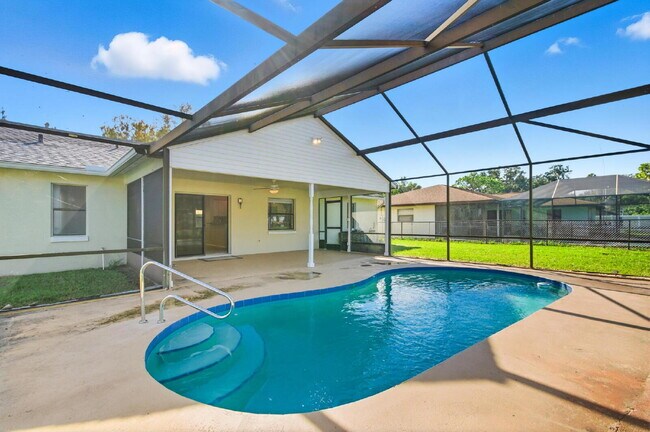 Building Photo - "Charming 3-Bedroom Oasis with 2 Baths on ...