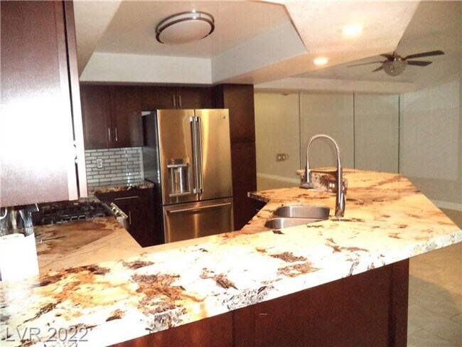 Building Photo - BEAUTIFUL FIRST FLOOR CONDO IN GATED COMMU...