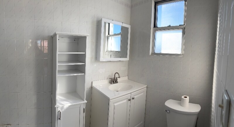 Building Photo - 21-75-2148 48th St